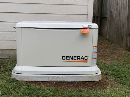 Newly installed Generac generator on a composite pad