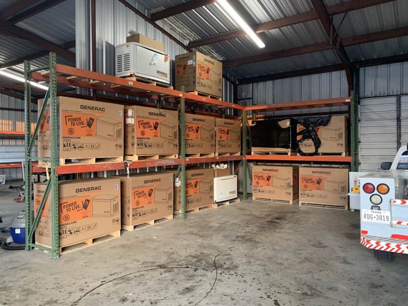 Generac equipment stocked on racks in the Texas Generators shop
